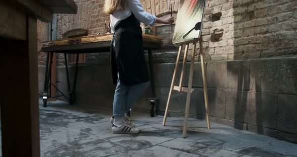 Talented Innovative Pretty Female Artist Draws with Brush on the Canvas. Contemporary Young Woman alt