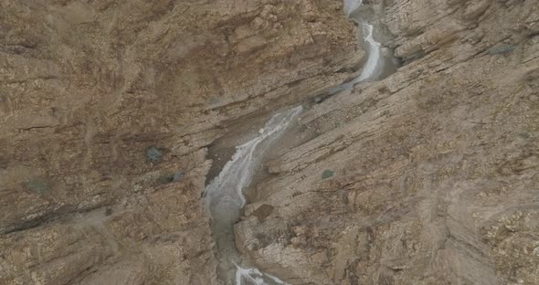 Aerial view of a waterfall in a desert, Israel. alt