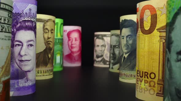 Foreign currency money exchange concept. Many banknotes of different nations. alt