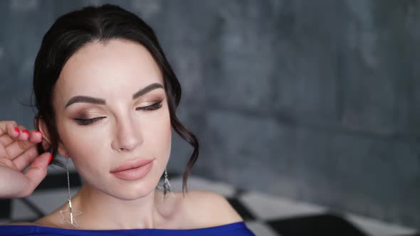 Girl in Blue Long Dress Lying on an Old Couch alt