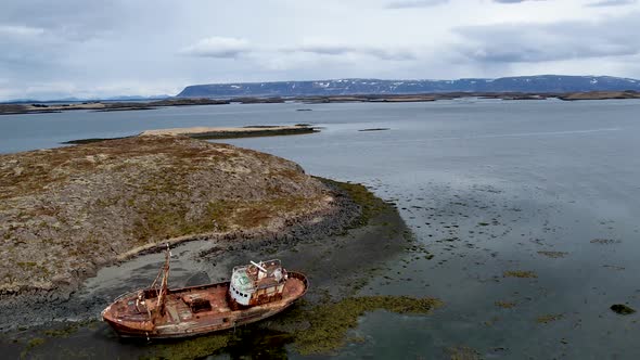 Western Iceland Drone Forgotten Boat wrecked on Baron Island with Black Sand Beach alt