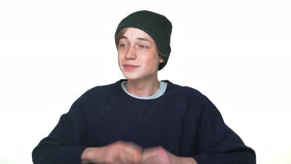 Portrait of Hipster Teenager in Braces Wearing Hat Can't Stop Laughing Showing Thumb Up Nodding alt