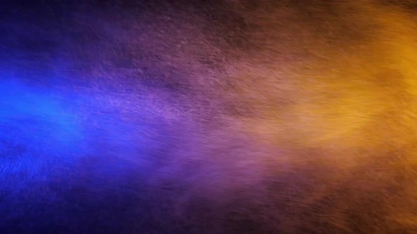 Blue and Yellow Water Spray Mixed on a Black Background. Slow Motion alt