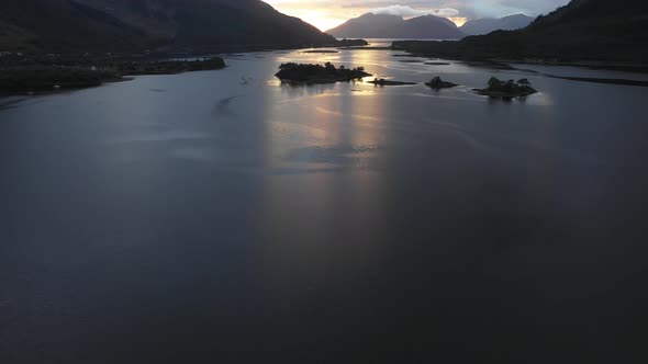 Aerial drone view of Loch Leven in Scotland at sunset