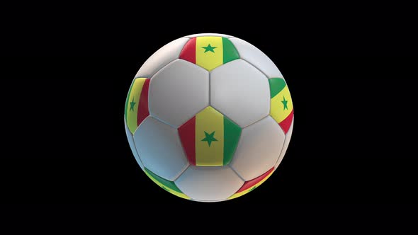 Soccer ball with flag Senegal, on black background loop alpha