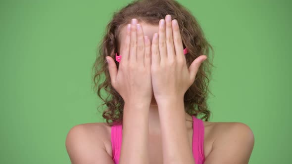 Young Happy Beautiful Nerd Woman Playing Peekaboo alt