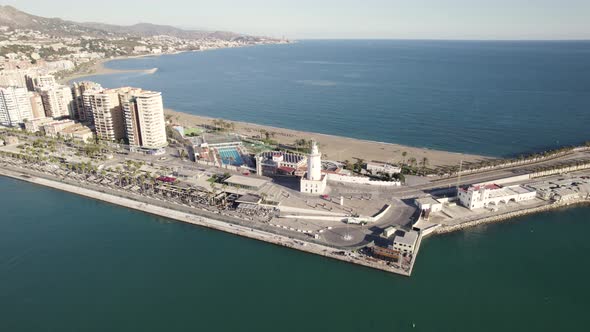 Aerial view of La Farola Malaga Lighthouse at harbour, Costa del Sol, Spain