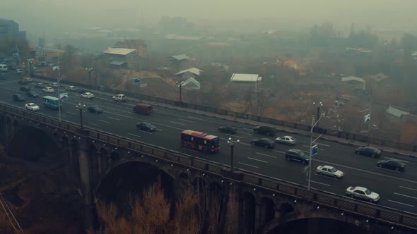 Cars Traffic Over the Bridge in the Fog