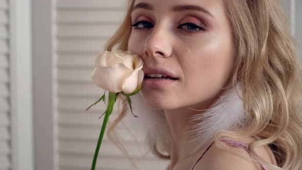 Romantic Sensual Woman Portrait With Rose Flower