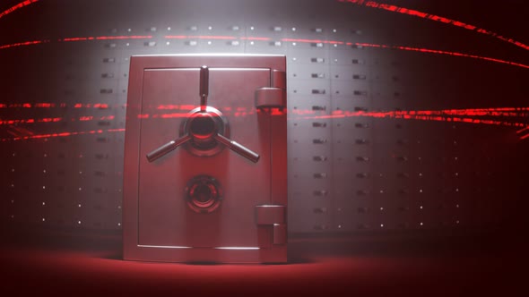 Steel safe and deposit boxes in secured room by red, moving laser system.