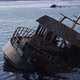 sunken boat near the rocks	 - VideoHive Item for Sale