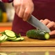 Chef chopping fresh, green  cucumber. - VideoHive Item for Sale