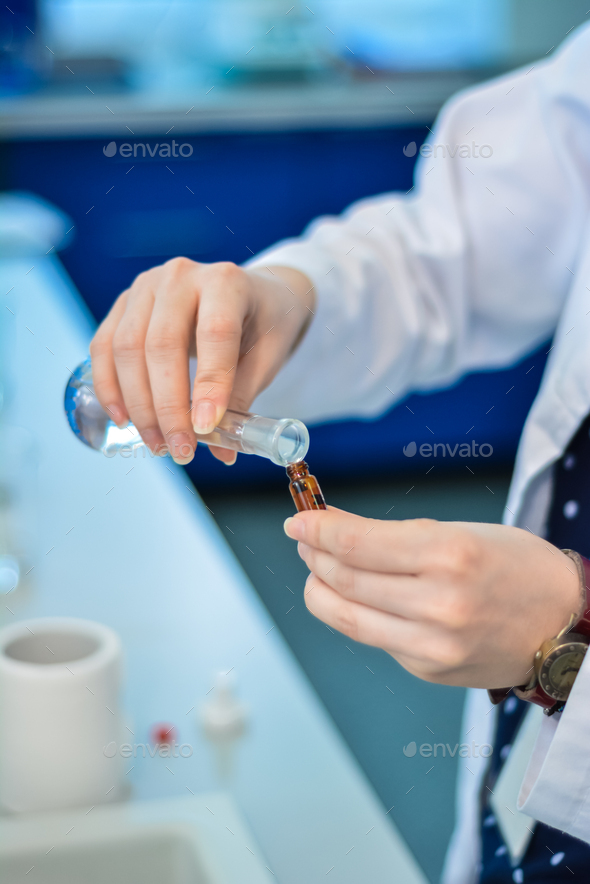 Pouring substances in laboratory