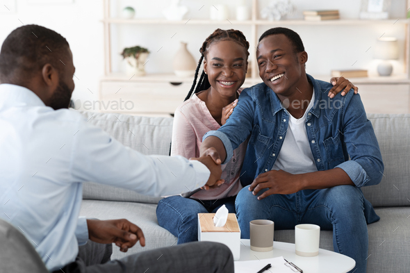 Happy Black Spouses Thankful To Family Counselor After Successful Marital Therapy