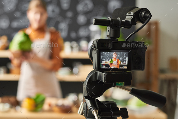 Woman recording the blog - Stock Photo - Images