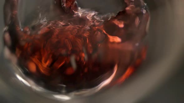 Wine pouring slowmotion close up