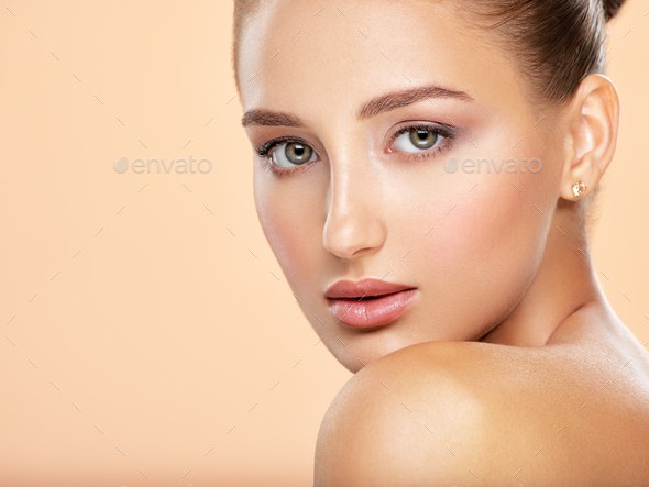 Beautiful face of young caucasian woman with perfect health fresh skin - Stock Photo - Images
