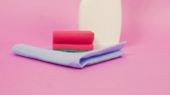 Closeup of a Spray Bottle with Cleaning Agent a Cleaning Cloth and a Sponge