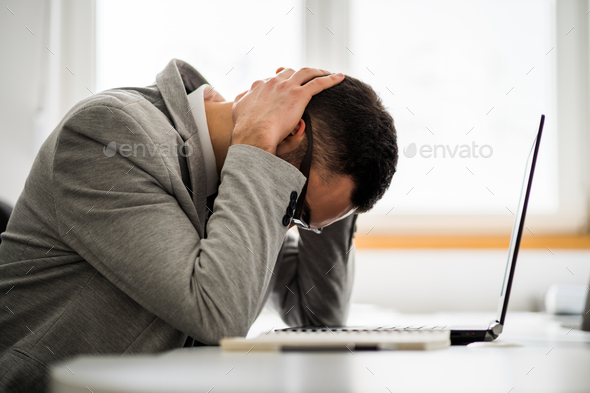 Overworked businessman - Stock Photo - Images