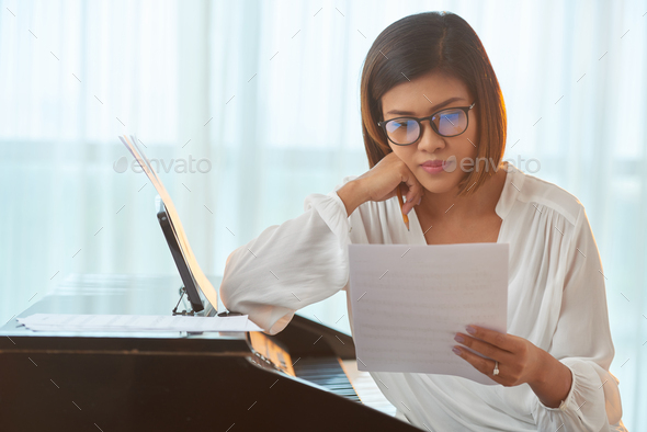 Asian music composer - Stock Photo - Images