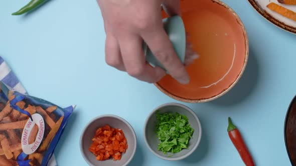 Vertical Food Video the Cook Mixes Spicy Sauce for Making Tacos