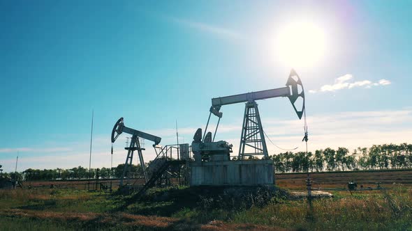Oil Development Site with Functioning Pumping Units, Oil Well, Crude Oil, Drilling Rig, Oil Field alt