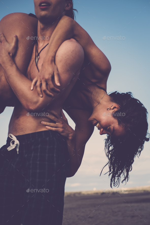Attractive young lovers have couples playing - Stock Photo