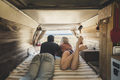 couple in vacation viewed from inside an old restored van - PhotoDune Item for Sale