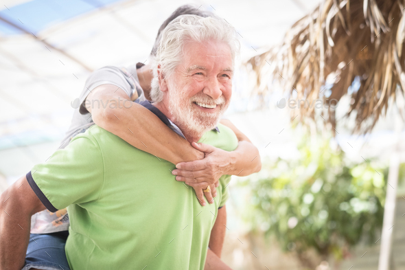 happiness for beautiful caucasian couple carrying out and enjoy the leisure activity outdoor - Stock Photo - Images