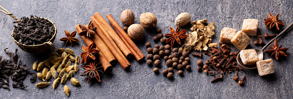 Spices for Indian Masala Tea. Grey background. Close up. Stock Photo by  annapustynnikova