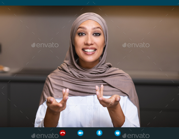 Arab Lady Talking Having Distant Meeting Via Video Call Indoors