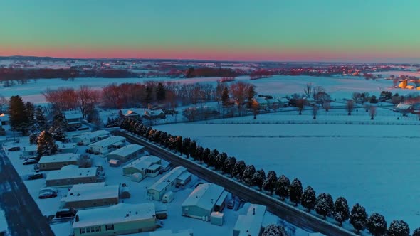 Aerial View Across Countryside Farmlands and a Mobile, Manufactured, Modular Home Park alt