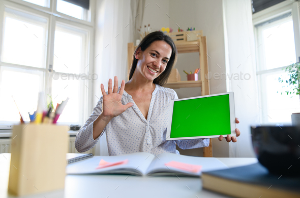 Woman teacher teaching online, coronavirus and keyable screen concept.