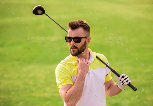 Guy playing golf