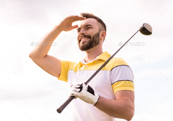 Guy playing golf