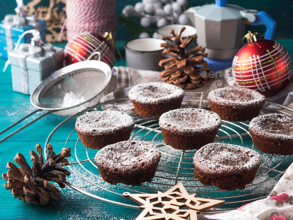 Chocolate winter muffins with icing sugar Stock Photo by tenkende ...