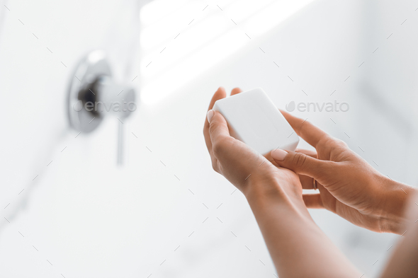 Unrecognizable Lady Washing Hands Holding Antibacterial Soap In Bathroom, Closeup