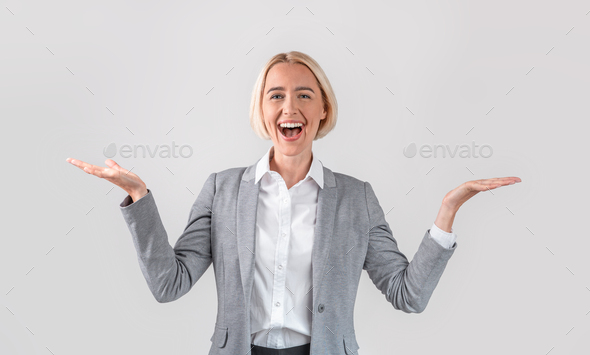 Businesswoman comparing options, making scales, holding invisible objects on light grey background