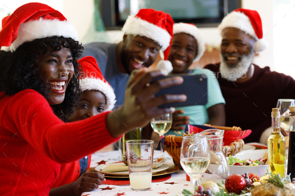 Multi generation african american family taking a selfie with smartphone