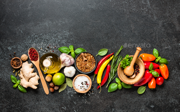 Cooking ingredients on black background - Stock Photo - Images