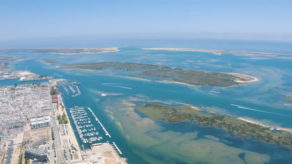 Panoramic view over  Faro district Lagoon in Portugal, Europe in the Ocean 4K
