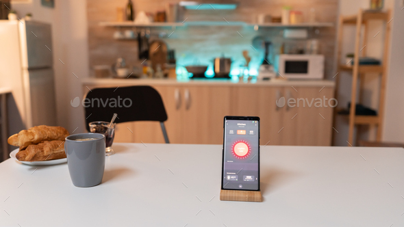 Smartphone with smart home application to turn on and off the lights