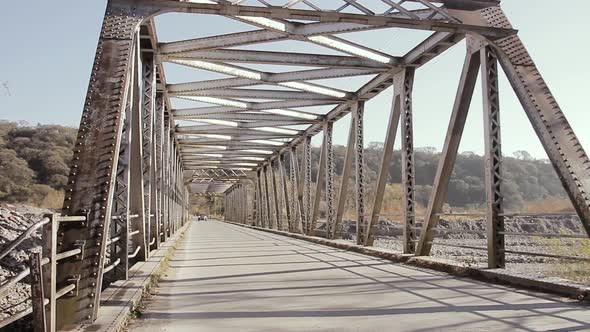 Old Riveted Iron Bridge in Jujuy province, Argentina. alt