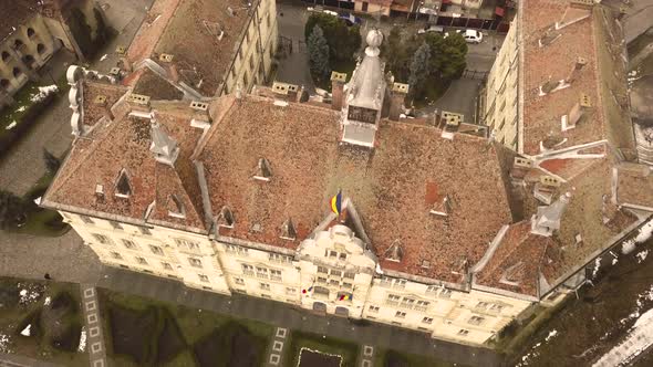 A drone shot, with orthomosaic framing and downward motion with pan, capturing a glimpse of a vintag alt