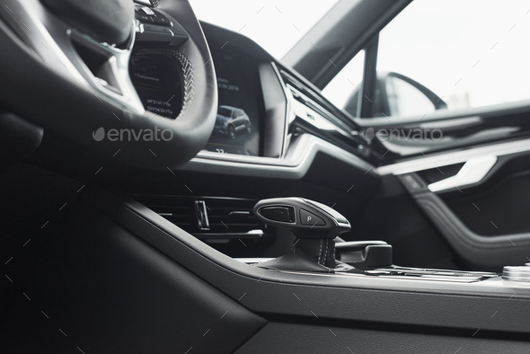 Interior of a prestigious modern black car. Leather comfortable seats and accessories and steering - Stock Photo - Images