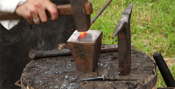 Blacksmith At Work In The Smithy 1