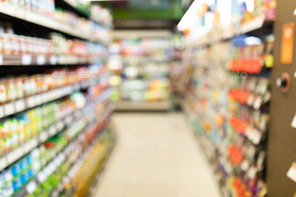 Blurred Supermarket Background, Grocery Store Aisle With Shelves And  Products Stock Photo by Prostock-studio