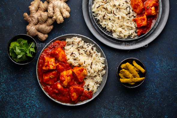 Chicken tikka masala dish with rice - Stock Photo - Images