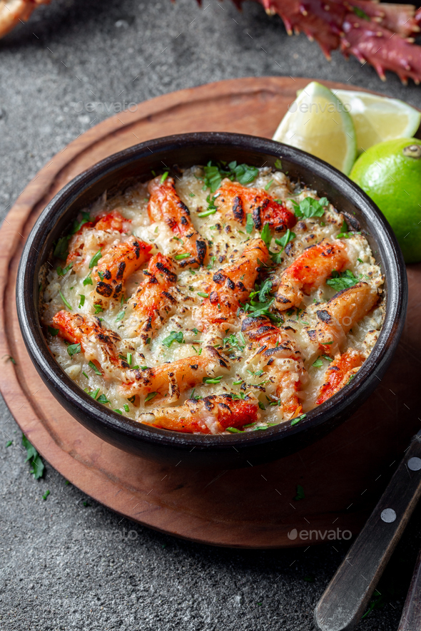 Baked crabmeat crab meat with cheese, cream and bread. - Stock Photo - Images