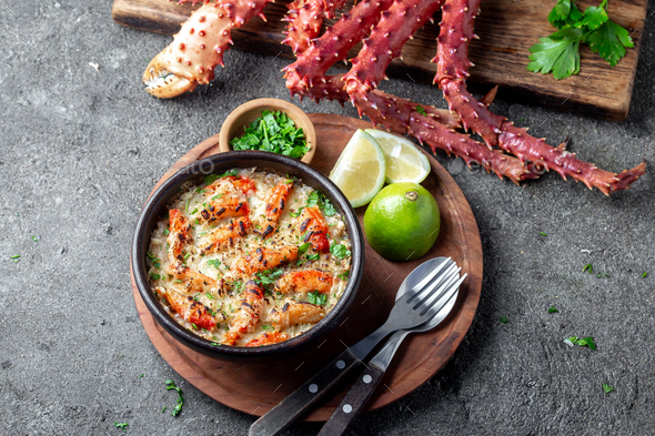 Chilean food. Baked crabmeat crab meat with cheese, cream and bread. Pastel o chupe de sentolla or - Stock Photo - Images